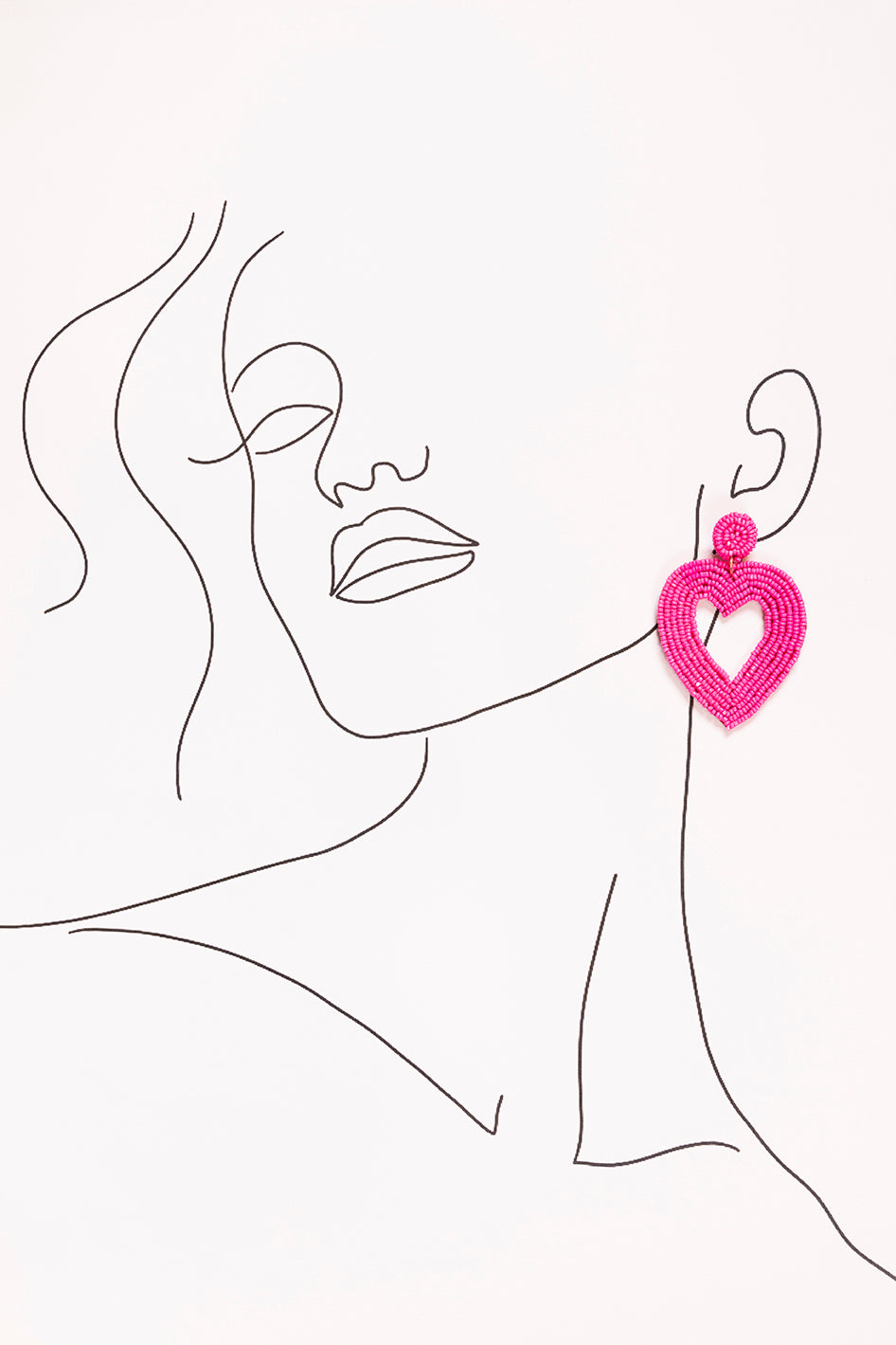 Hollow Heart Beaded Earrings in Hot Pink