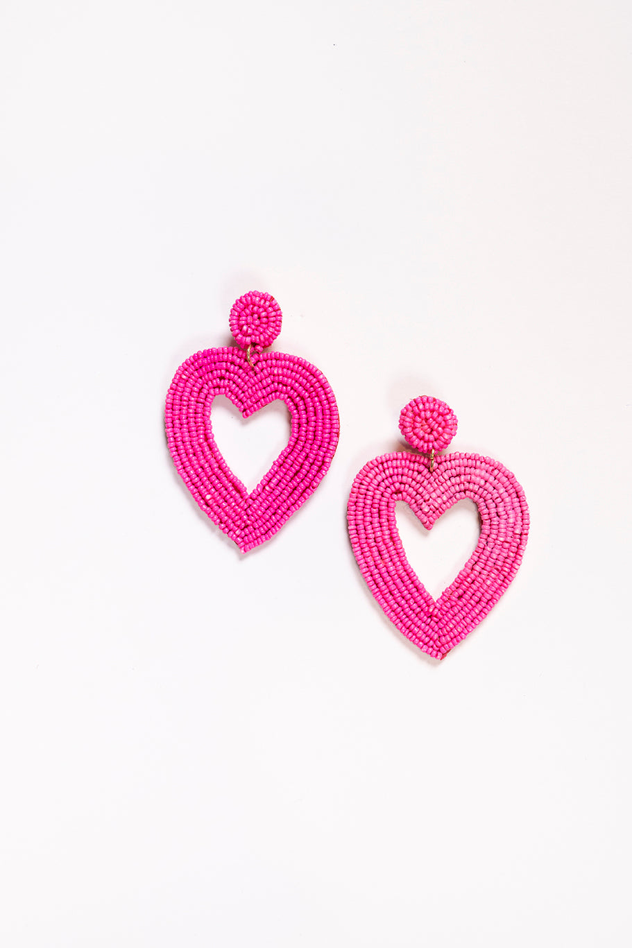 Hollow Heart Beaded Earrings in Hot Pink