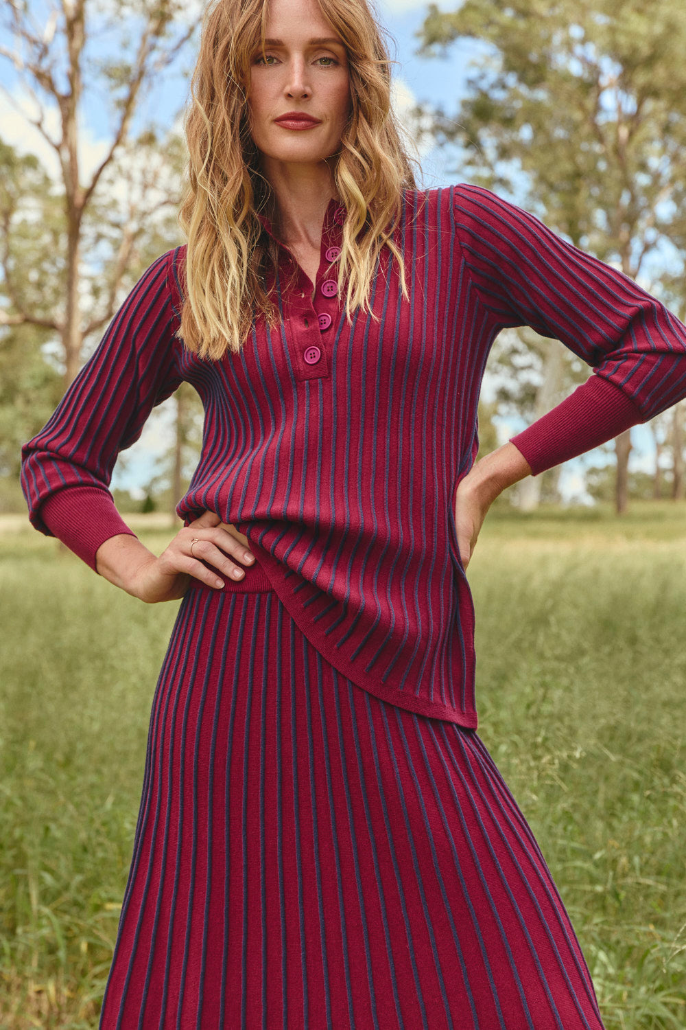Knitted A-Line Skirt in Cherry Red with striking cherry red background colour, Adrift Clothing
