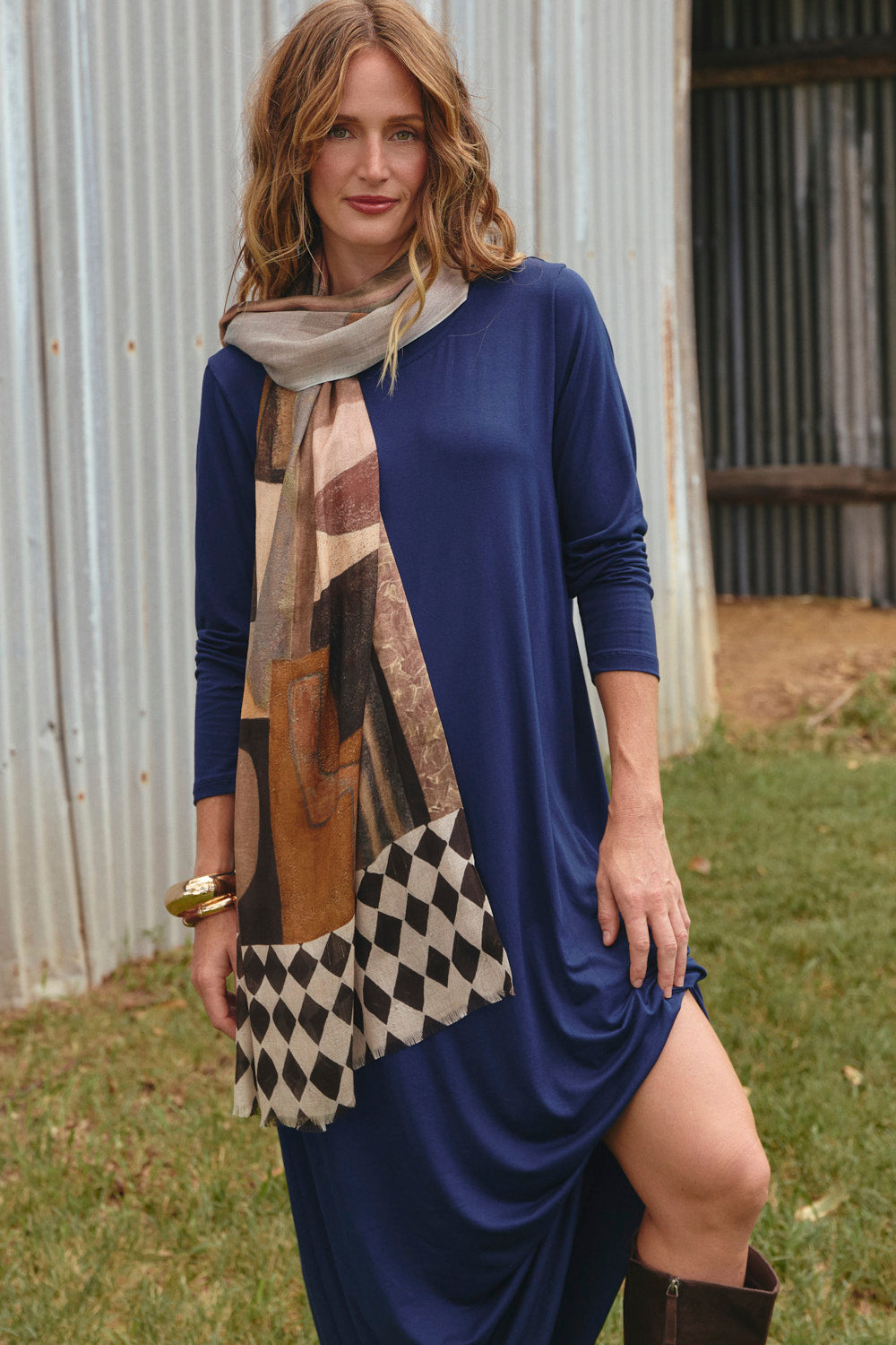 Model wearing the Long Sleeve Swing Dress in Navy with long relaxed sleeves, Adrift Clothing