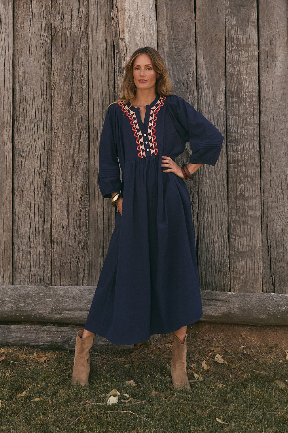 Model wearing the Elodie Smock Dress in Nocturne with 3/4 sleeves and elasticated cuffs, Adrift Clothing