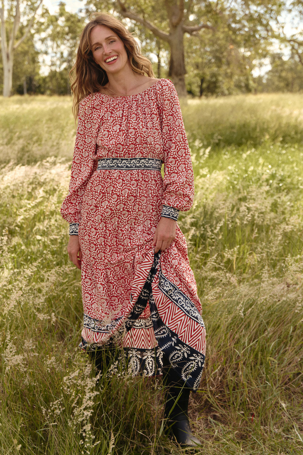 Isla Tiered Dress in Sundar Drift in fluid 100% rayon with rust and navy print, Adrift