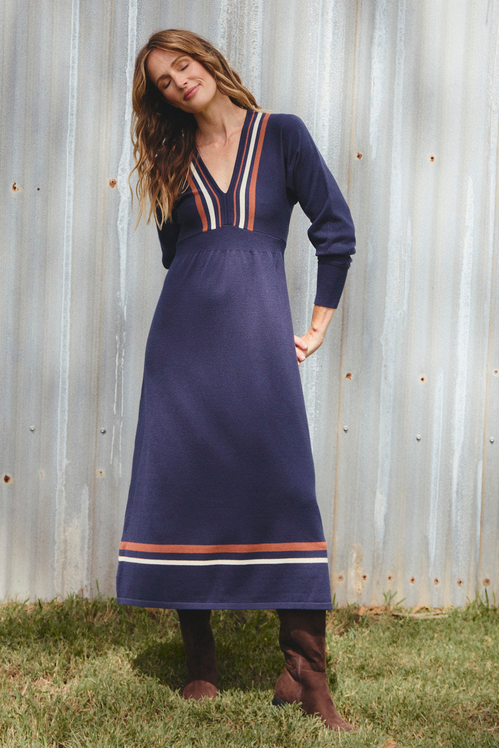 Knitted V-Neck Dress in Navy Spice, navy background with bold stripe detail, Adrift