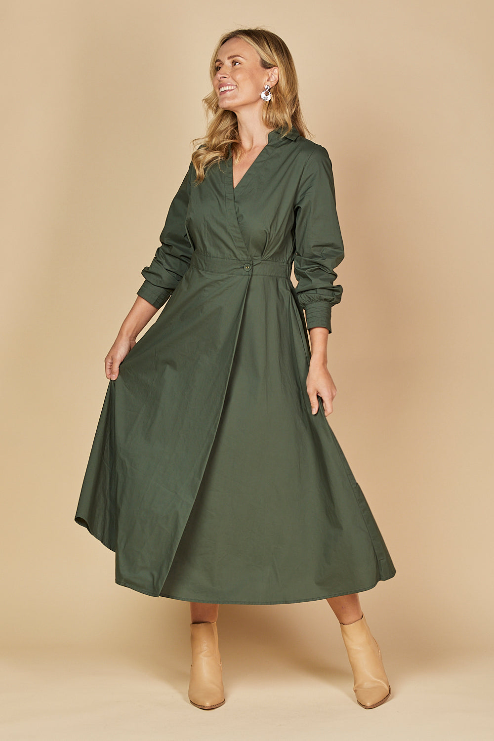 Tan knee boots with wrap dress outfit